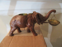 CAST IRON ELEPHANT CIGARETTES, MATCHES AND ????