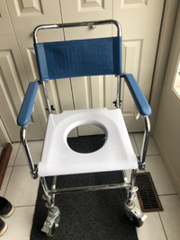 ATS 500A Wheeled Drop Arm Commode fits over toilet