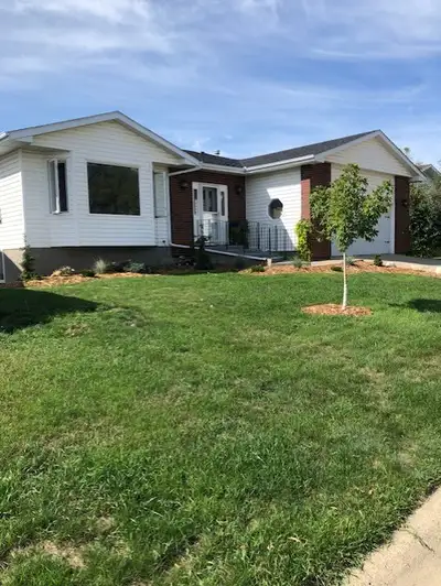 Beautiful bright peaceful home in Lacombe. ,1100 sq.ft. lower level for your personal living area. T...