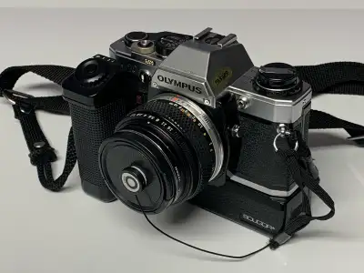 OLYMPUS OM-10 SLR FILM CAMERA, View more