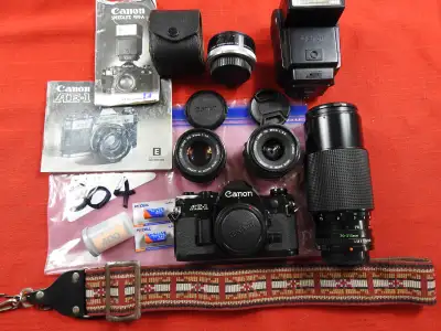 Canon AE-1 35mm SLR FILM camera bundles. Professionally serviced Updated: January 18, 2024 Please no...