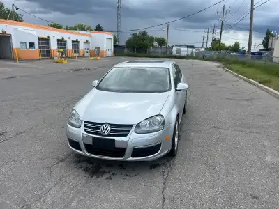 2006 Volkswagen Jetta (4-Door) Reliable daily driver with a new battery Features & Maintenance: * 4-...