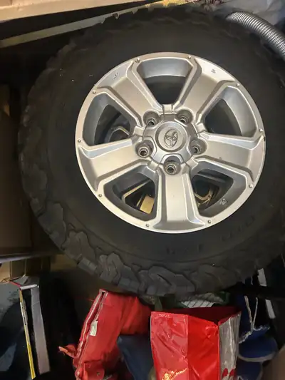 Set of 4 Tires and rims off Toyota Tundra just bought at start of winter truck got in accident so I...