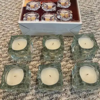 Set of 6 never used, crystal candles. Great quality. Would be a great wedding/shower gift.