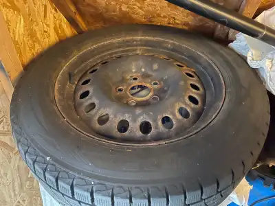 Snow tires with rims.