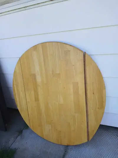 Round Solid wood table with drop leaf sides, View more