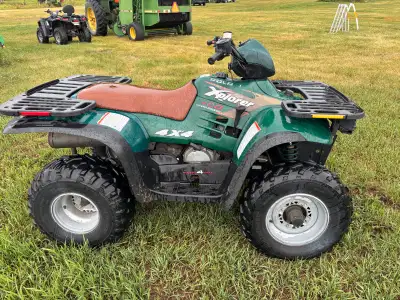 1996 Polaris 400 Explorer 4x4. 400cc engine and automatic transmission, forward (hi/low) neutral and...