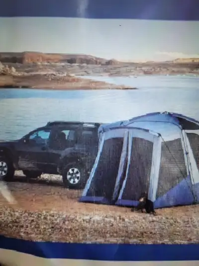 SPORTZ SUV Tent...in like new condition ....attaches to your SUV ...great quality ... This gives you...