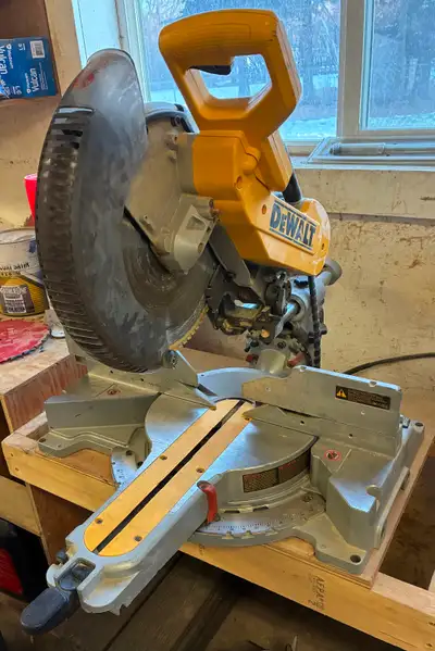 Used Dewalt 12” sliding compound miter saw. Model DW718. Open to reasonable offers. Please message m...