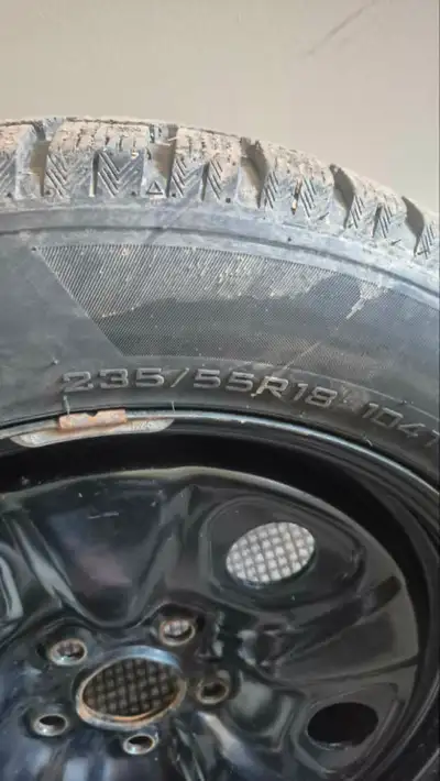 like new four 235/r55/18 snow tires on rims with new sensors. rims are 1.5 years old. came off a 201...