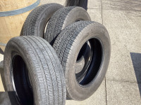 Four tires from a Mazda CX-5. Bridgestone P225/65R 17 7/12 tread