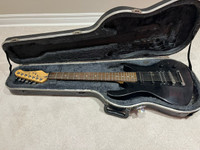 Jay Turser 7 string guitar with case
