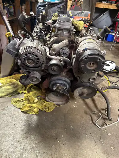 I have an engine out of a 1996 GMC sierra standard cab longbox ready for pick up. The engine run fla...