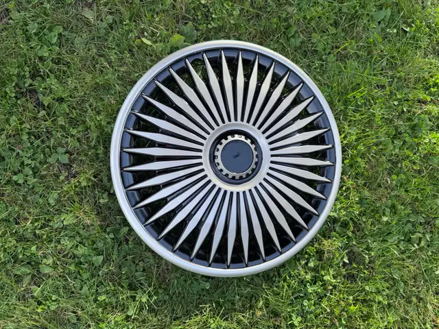 New 16-inch wheel center caps, never installed because the car was sold