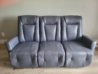 Beautiful all leather power reclining sofa and chair set