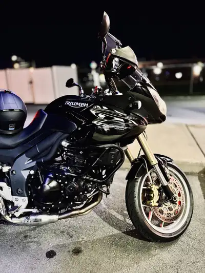 Looking for a classic adventure tourer that still crushes miles? This 2009 Triumph Tiger 1050 ABS is...