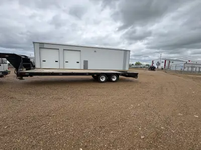 For Sale 2007 30’ low profile tandem dually Gooseneck trailer. 2- 10,000 Dexter axles , flip up Ramp...