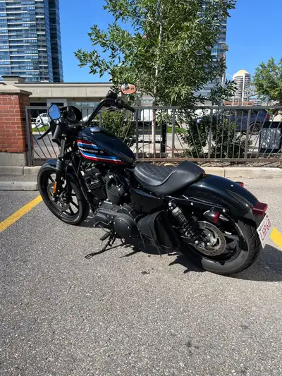 I'm selling my 2020 Harley-Davidson Iron 1200 Sportster in sleek black, a true embodiment of classic...