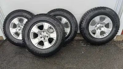Set of winter tires, ram factory rims with sensors used for less than 1 season. 275-70-18 Call 613-8...