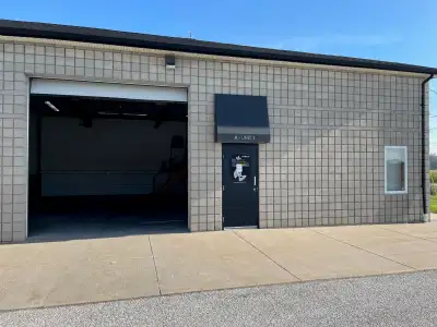 SHOP AND OFFICE available immediately. 12x12 bay door, 2 offices, close to Windsor airport , EC Row...