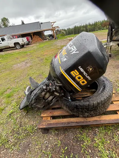 Optimax 99 200hp mercury boat motor. Excellent running condition. 2 stroke. Oil injection. Located w...