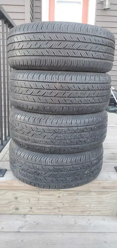 Set of 4 Continental all season tires, size: 215/55/R16, without rims, no patches or plugs, with exc...