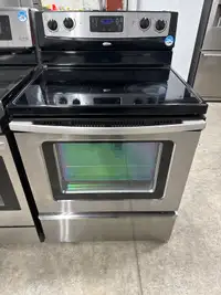 Whirlpool electric glass top stove. 