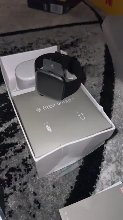 I'm selling a Fitbit Versa 2, a sleek and functional smartwatch designed to track your fitness and w...