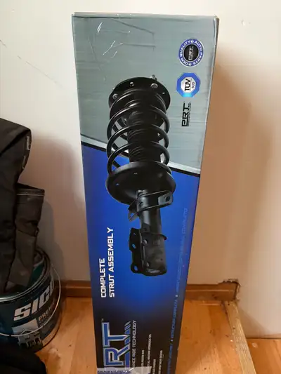 Front left strut for sale still in the box. Bought it for just over 100 from RockAuto for my 2015 Ta...