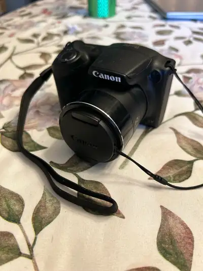 Canon PowerShot SX410 IS Black 20.0 MP Digital Camera, View more