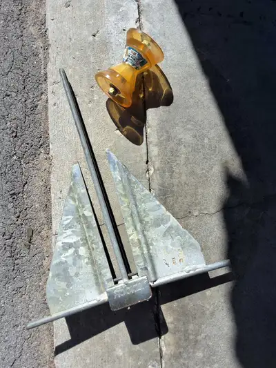 This pre-owned galvanized E-130 Hooker boat anchor is a reliable choice for securing your vessel, me...