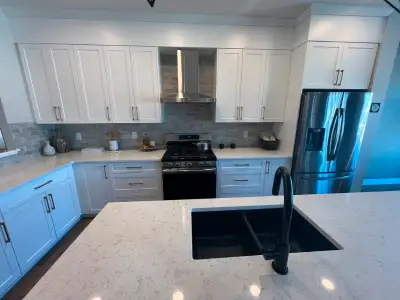 Why settle for repainting when you can get a stunning, completely new kitchen at the same price? Col...