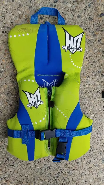 HO Sports green infant neoprene life jacket/vest for up to 30 lbs. Small tear near the handle, but i...