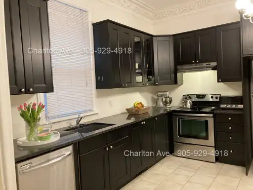 Extra Clean, Bright and Spacious 2 Bedroom home in Durand Neighbourhood. Parking and Yard included....