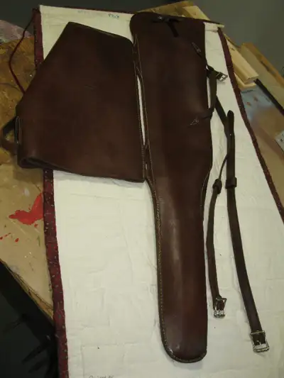 Premium Hooded Leather Rifle scabbard made by Hunter in excellent shape (New over $400) Pick up cash...