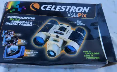 Discover the world up close with these Celestron VistaPix 8x22 combination binoculars and digital ca...