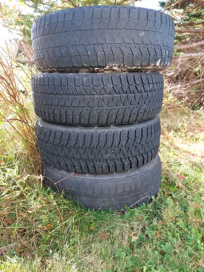 4 Blizzak WS 90 winter tires 195/65 R 15 on rims from a 2012 Honda Civic . 2 in very good condition...