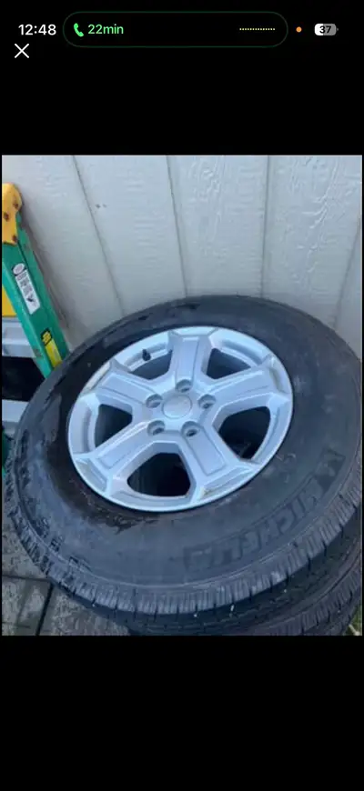 Selling a full set of 5 Michelin winter tires of Jeep Wrangler alloy rims — includes matching full-s...
