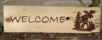 HANDCRAFTED WOODBURNED WELCOME SIGN WITH MOOSE AND PINE