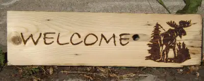 HANDCRAFTED WOODBURNED WELCOME SIGN WITH MOOSE AND PINE, View more