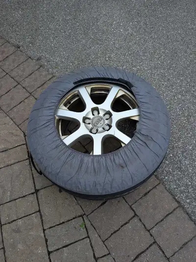 Winter tires and rims package mounted on 17-inch rims. Package originally purchased from Audi for $3...