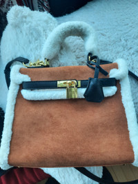 Faux suede and shearling bag