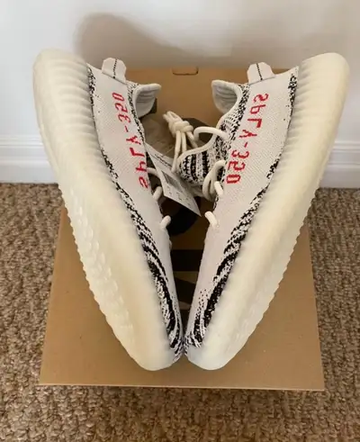 Selling a brand new pair of Adidas YEEZY Boost 350 V2 in size 10.5. These stylish sneakers are known...