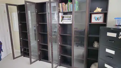 3 BILLY bookcases with glass doors, View more