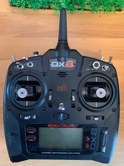 Spektrum DX8 controller. Excellent condition. Comes with box. manual charger. NO RX Located in Etobi...