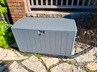 Grey resin garden deck box for storage. If ad is up, item is available. See link below for details....