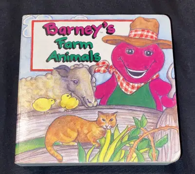 Dive into farmyard fun with this used Barney's Farm Animals board book! This delightful book feature...