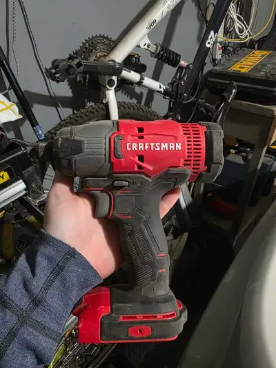 This Craftsman 20V cordless impact driver is ready to tackle your next project, showing signs of reg...