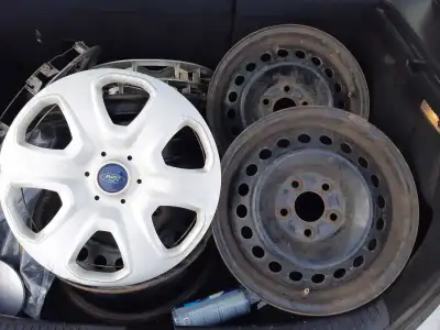 I am selling a set of Ford steel wheels, (4)..perfect for winter tires or as a spare set. With a (4...