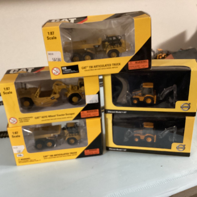 Ho scale Diecast Cat and Volvo construction vehicles in Toys & Games in Cape Breton